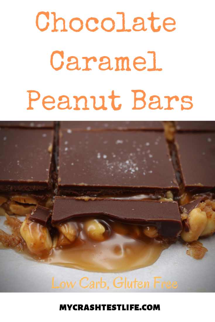 Never again will you miss a store bought Snickers! These chocolate caramel peanut bars are simple to make, gluten free and low in carbs. No baking necessary! Simply layer peanuts, caramel and chocolate for the ultimate keto chocolate bar.