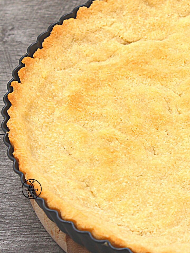 top view of a keto almond flour pie crust in a tart pan