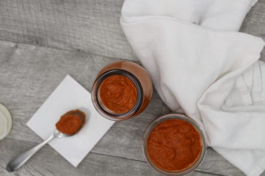 Delicious Whole30 approved smokey barbecue sauce. By simply cooking onions and bacon and then adding a tomato base and a couple of spices, you can have a keto, low carb, sugar free BBQ sauce in minutes!