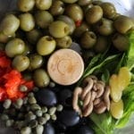 Simply combine olives, basil, capers, sundried tomatoes and some garlic and within minutes, you have a delicious sundried tomato olive tapenade. Low carb, gluten free and keto.