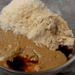 By simply combining sunflower seed butter and some coconut flour, you can create homemade Sunbutter Bars for a fraction of the price. #sunflowerseed #sunflowerseedbutter #seed #easy #copycat #sunbutterbars #allergyfree #schoolsafe #bars #chocolate