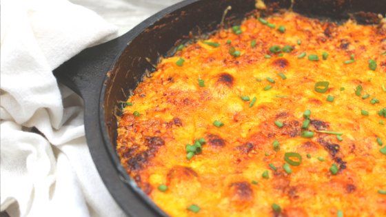 Simply combine cooked chorizo, cream cheese, Boursin in a cast iron skillet. Top with cheddar cheese and the keto chorizo dip is complete.
