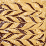 Using only one bowl, these delicious and healthy gluten-free low carb bars are easy to make and perfect for a quick breakfast to go.