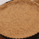 With only 5 ingredients, this crust can be used as the base for a cheesecake or a tart crust. Graham cracker in texture and taste, this crust requires only almond flour, flax, brown sugar, butter and cinnamon. Gluten-Free, Keto and simple, this will quickly become your go-to crust for all your desserts.