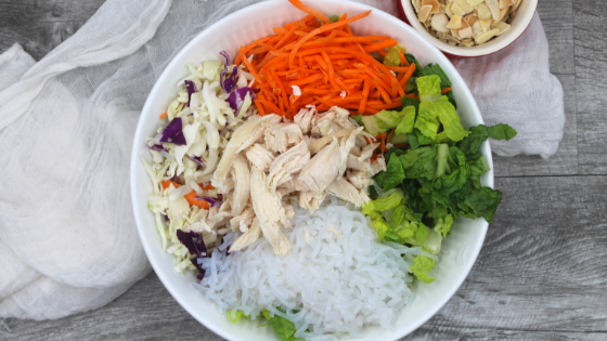 A Whole30, keto and healthy salad that comes together in minutes. Delicious Asian dressing is combined with noodles and chicken for an unbelievably tasty salad.