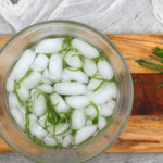 Thinly slicing onions and placing them in a bowl of ice water creates these beautifully curled onions. Impress your guest with a simple and elegant decoration at your next party.