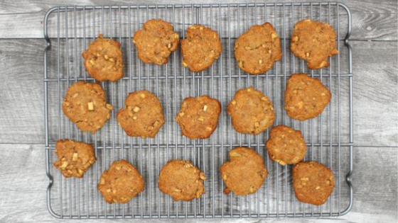 These Salted Caramel Apple Cookies are really easy to make and taste just like a caramel apple without all the mess. Simple ingredients such as almonds, apple and a sweet butter caramel drizzle make these cookies the perfect fall treat!