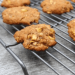 These Salted Caramel Apple Cookies are really easy to make and taste just like a caramel apple without all the mess. Simple ingredients such as almonds, apple and a sweet butter caramel drizzle make these cookies the perfect fall treat!