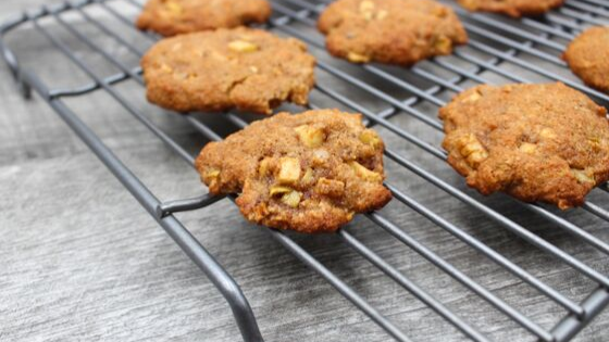 These Salted Caramel Apple Cookies are really easy to make and taste just like a caramel apple without all the mess. Simple ingredients such as almonds, apple and a sweet butter caramel drizzle make these cookies the perfect fall treat!