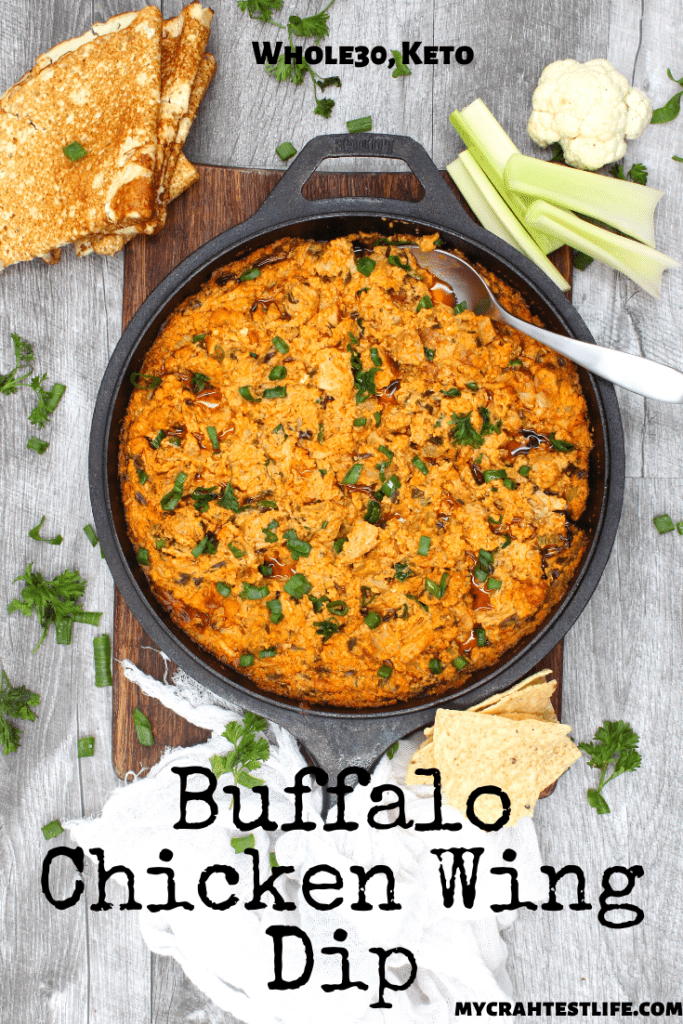 top view of skillet with buffalo chicken wing dip
