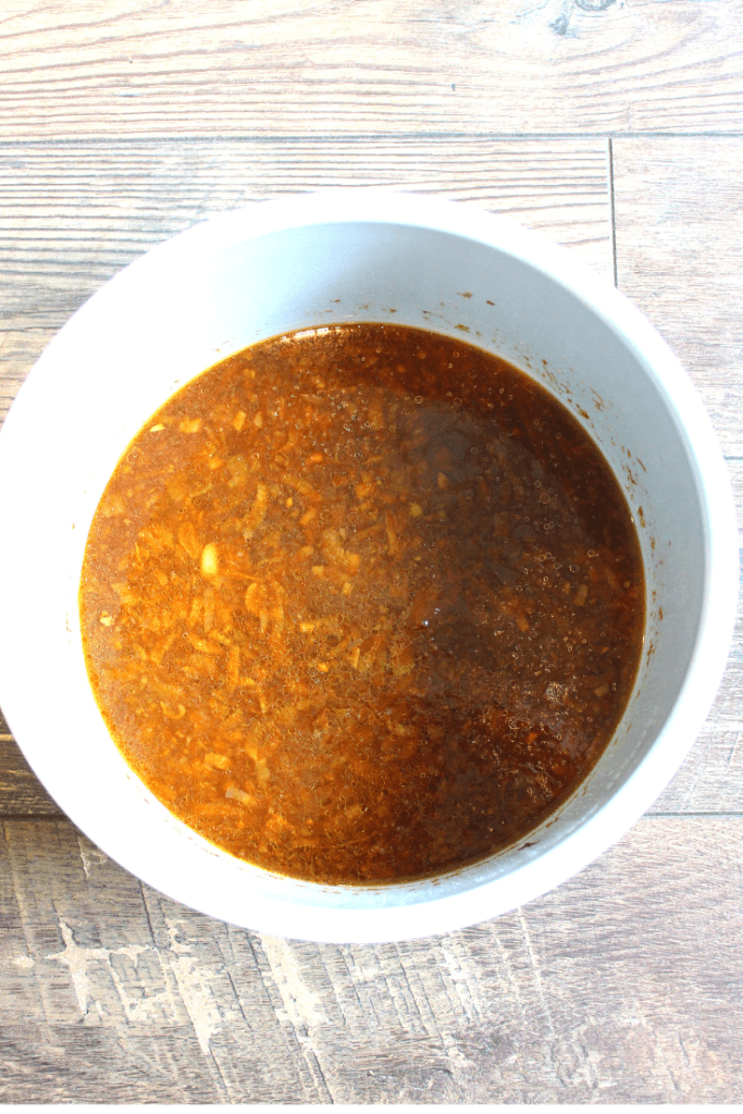 Instant pot filled with onion soup