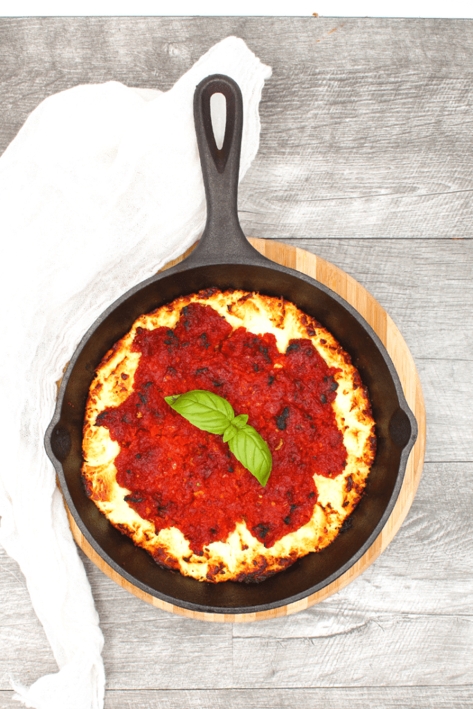Baked skillet with sun-dried tomatoes and goat cheese