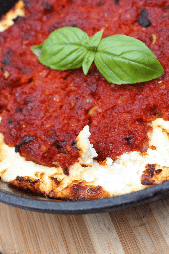 Close up of baked goat cheese