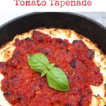 Skillet with goat cheese and sun-dried tomato tapenate