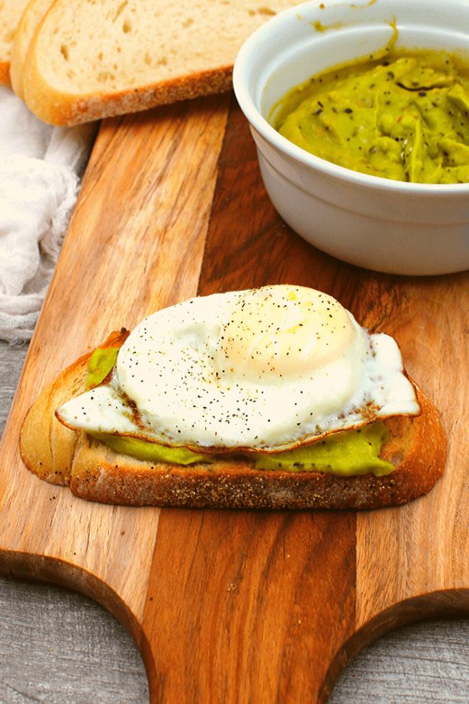 Top this Everything Avocado Spread it with an egg for the perfect fulfilling breakfast.