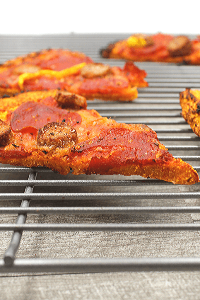 This dairy-free and gluten-free crust is strong enough that it can be picked up like regular pizza.