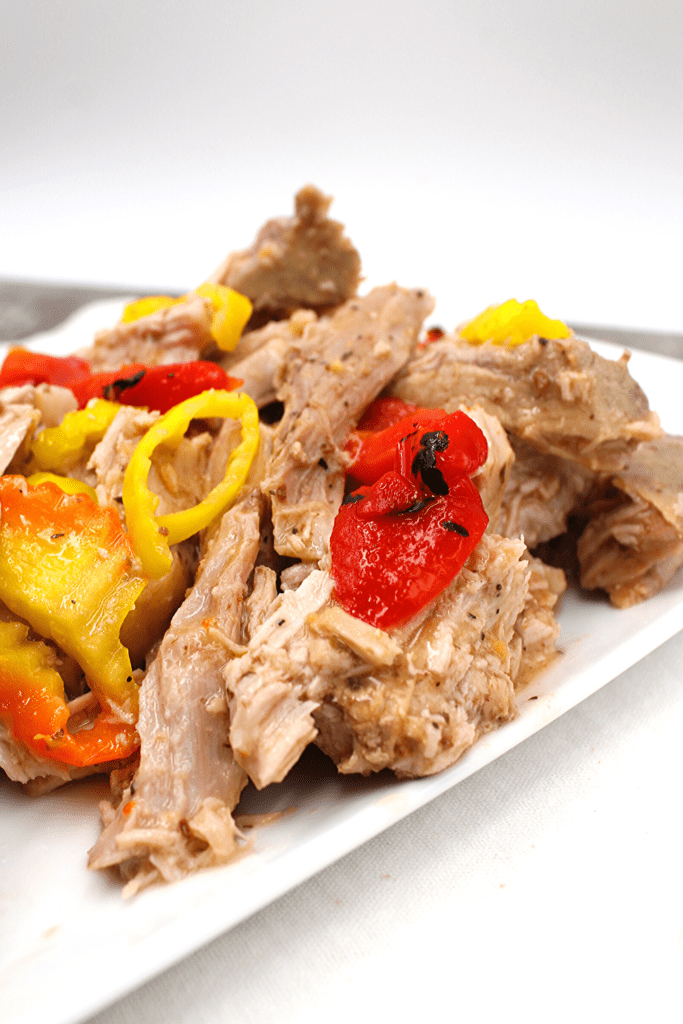 Make this juicy Italian pulled pork by combining pork loin, salad dressing and Italian peppers for the perfectly easy weeknight dinner