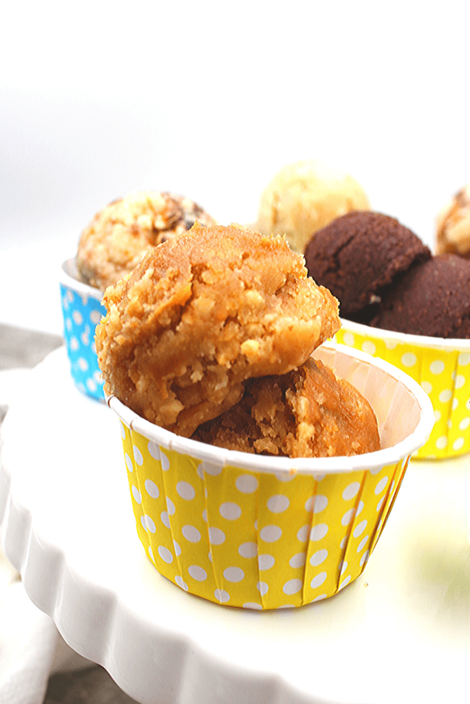Creamy peanut butter cookie dough with chunks of peanuts and peanut butter swril.