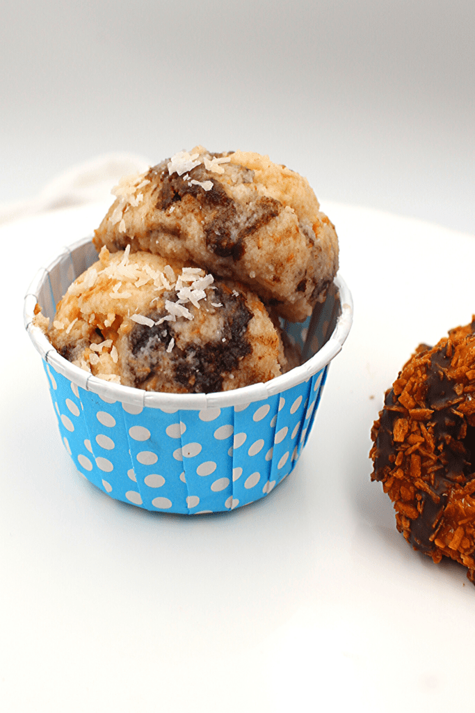 Crunchy coconut with creamy chocolate make the perfect Samoa gluten-free and keto cookie dough.