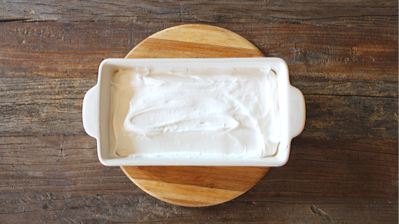 The marshmallow mixture spread in a pan and let it sit for 4 hours or overnight