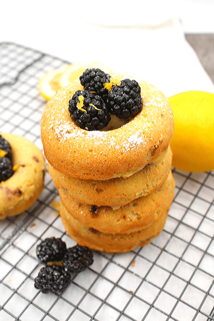 Fill the holes of the doughnuts with raw blackberries for an extra treat