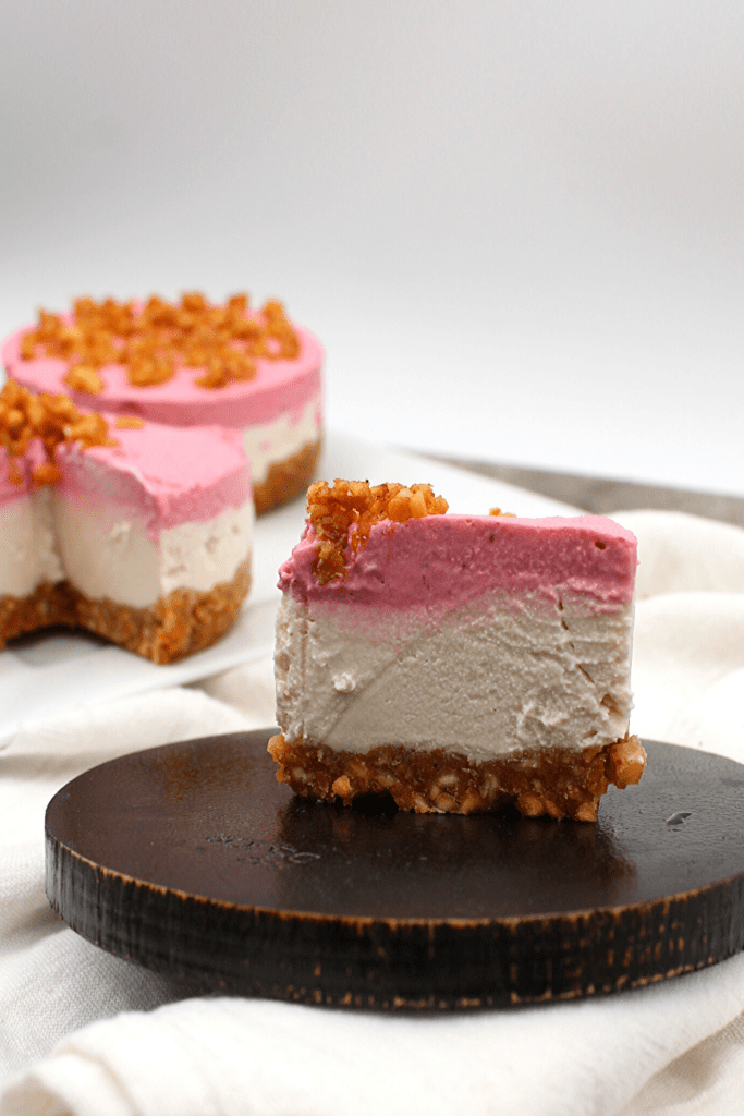 This creamy slice of white cheesecake with a layer or strawberry cream makes it the perfect summer treat
