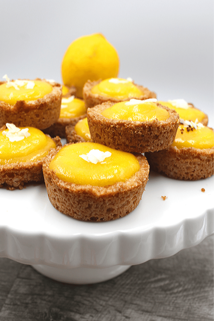 Creamy keto lemon filled gluten-free cookie cups.