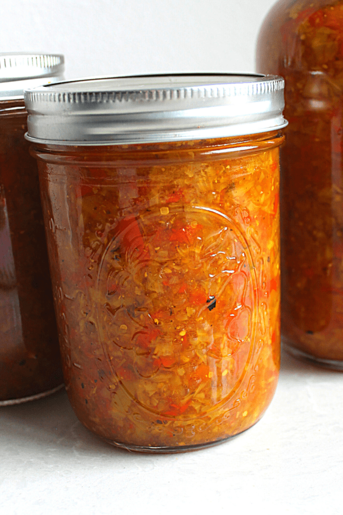 A jar packed with onions, tomatoes and cabbage for a delicious healthy sugar-free relish