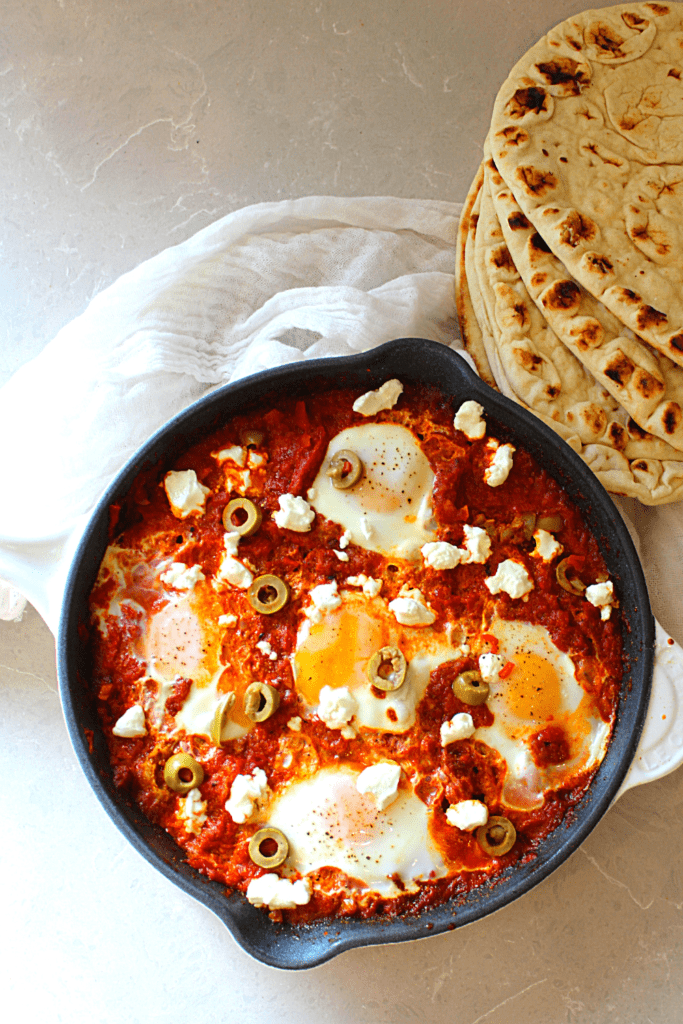 Thick and creamy tomato pepper sauce with runny eggs.