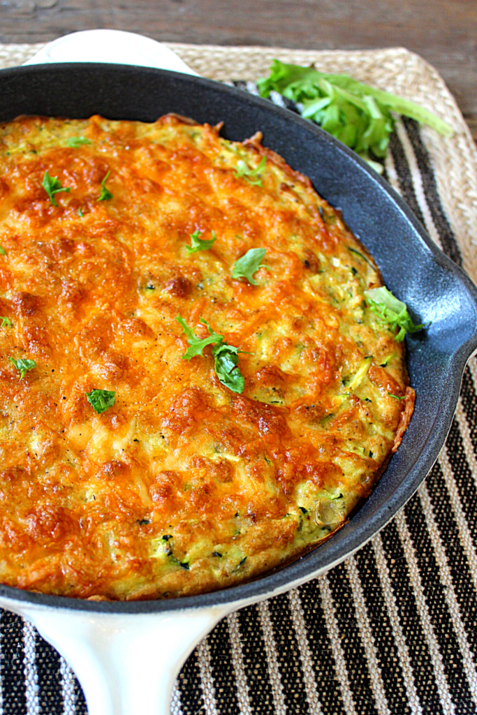 Zucchini pie with a crispy cheese topping