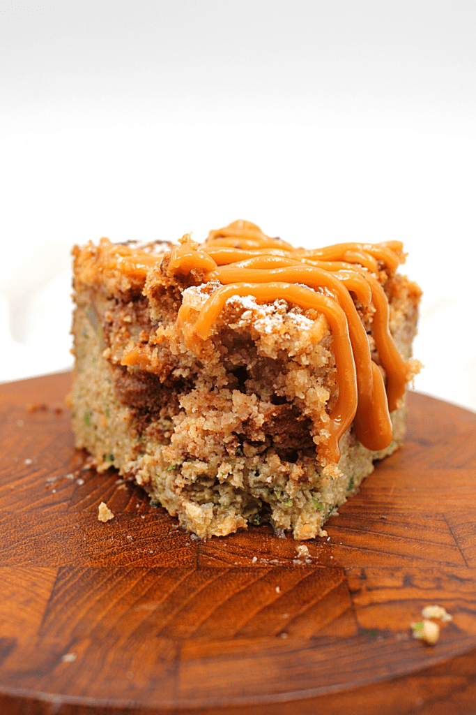 A delicious gluten-free moist zucchini crumb cake with a layer of apples.