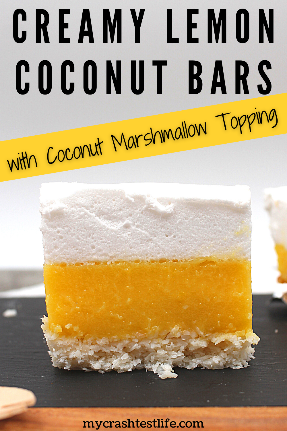 Keto and gluten-free Creamy Lemon bars on a coconut crust topped with coconut marshmallow layer