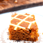 the best keto carrot cake bars stacked on top of each other
