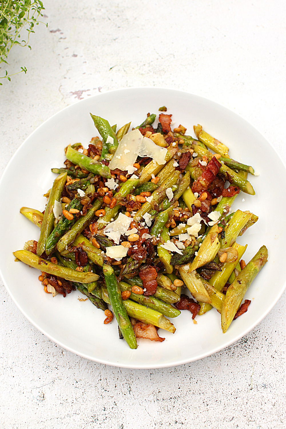 a bowl of warm asparagus salad