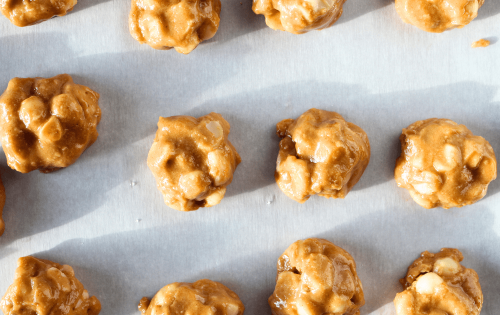 top view of sugar-free nut clusters formed into bites before going in the freezer to firm