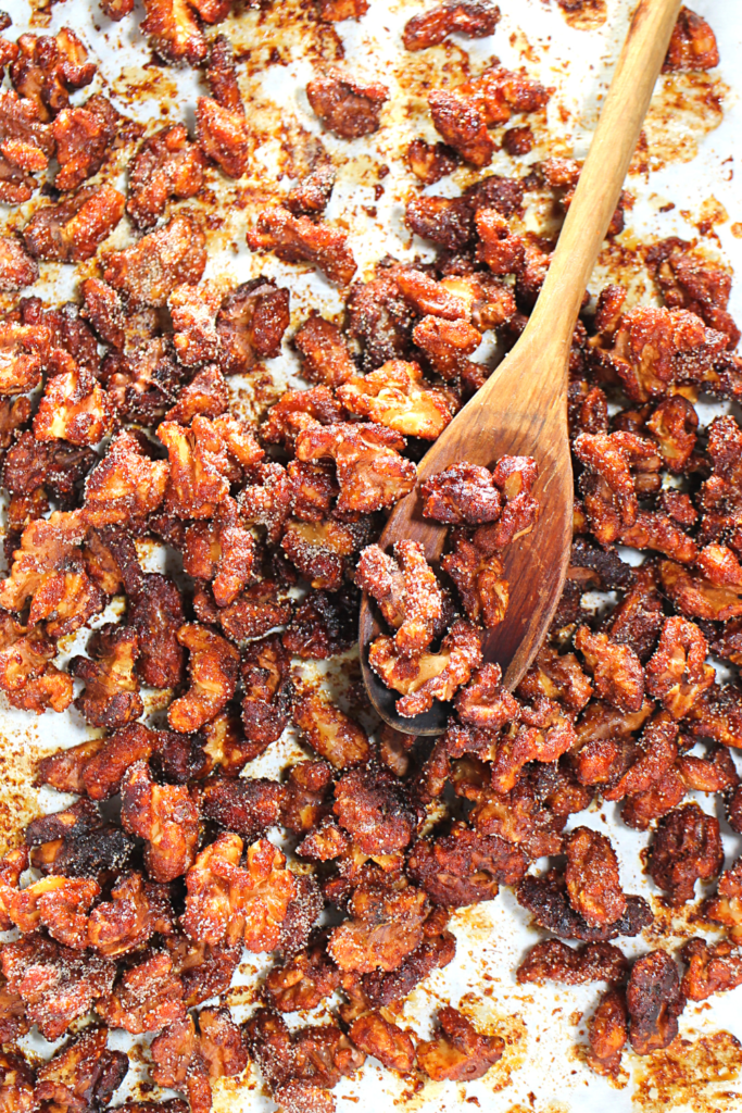 candied walnuts on a baking sheet