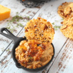 dip with a keto parmesan cracker