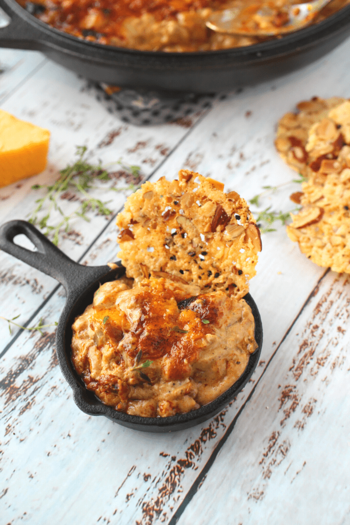 dip with a keto parmesan cracker