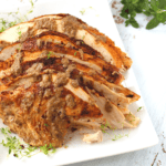gravy on top of sliced turkey breast