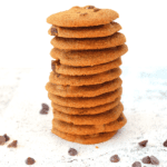 keto thin and crispy chocolate chip cookies stacked on top of each other