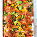 easy keto sheet pan chicken and veggies on a sheet pan lined with aluminum foil