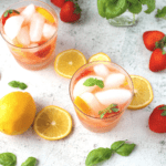 an easy keto cocktail made with muddled strawberries and lemon juice