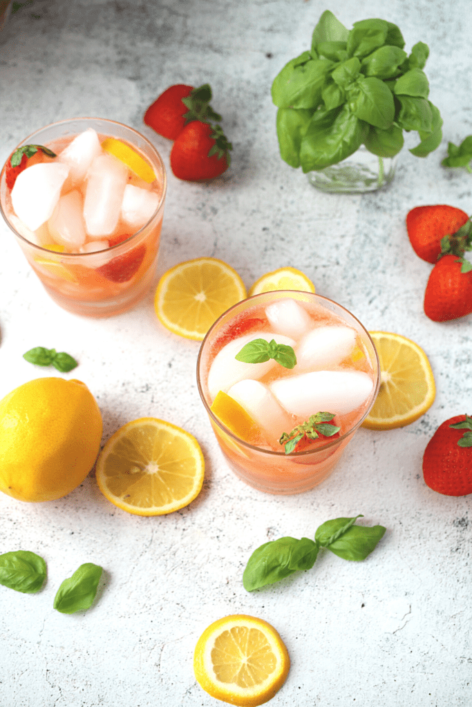 an easy keto cocktail made with muddled strawberries and lemon juice