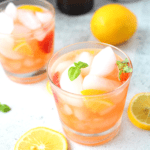 an easy keto summer cocktail in a glass with ice