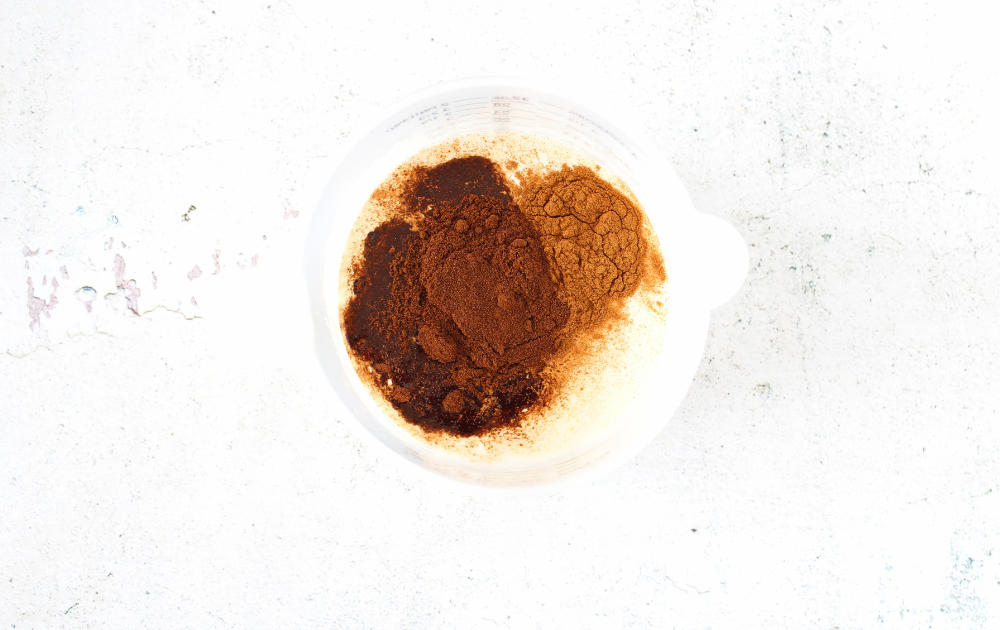 combine the heavy cream with the espresso and cinnamon powder