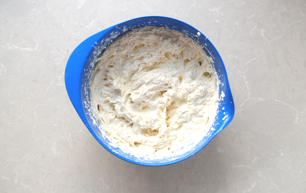 Combine the whipped cream cheese with the whipped heavy cream