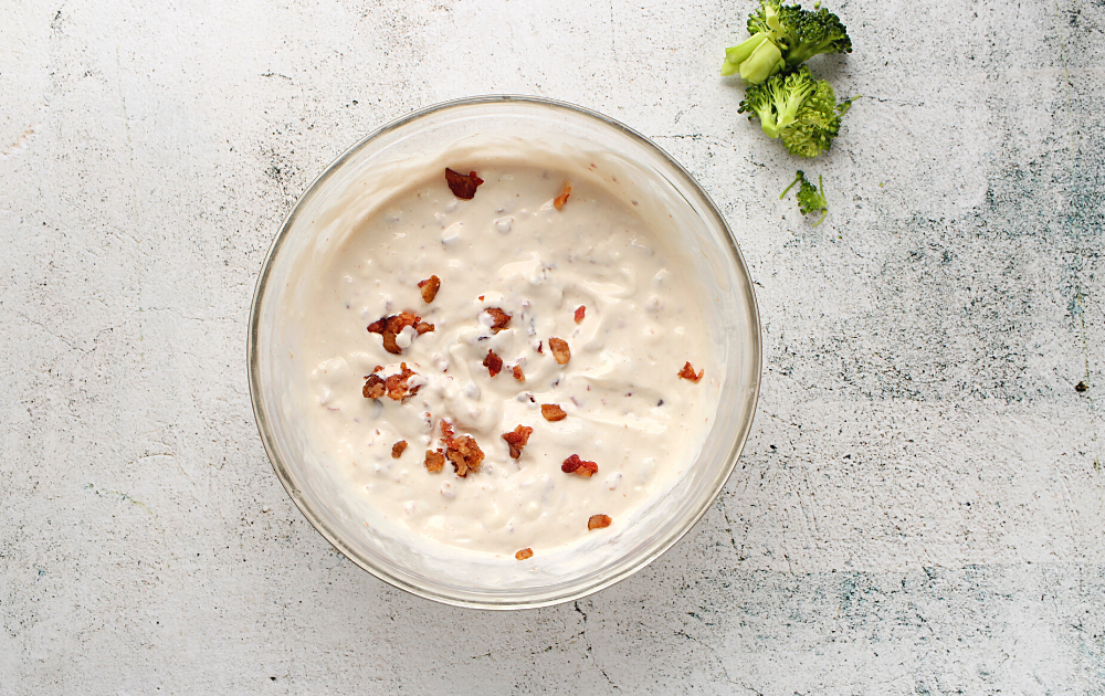 Sour cream, mayo, red wine vinegar, sugar-free maple syrup and bacon combine to form the salad dressing