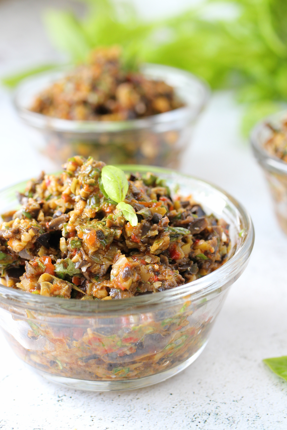 homemade olive tapenade in a glass serving dish