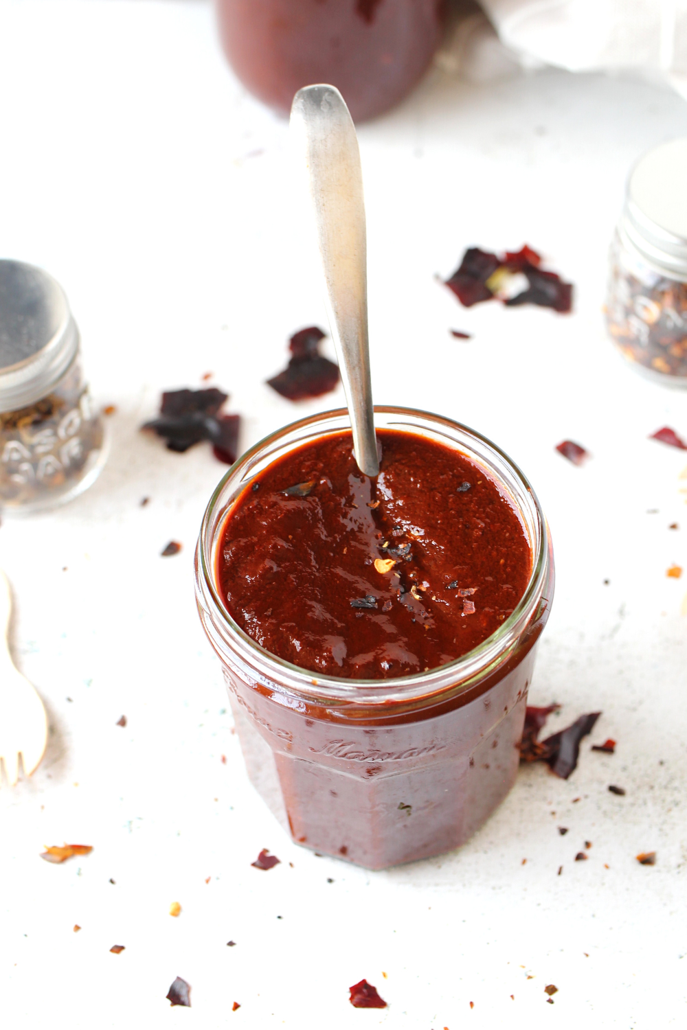 keto Mexican sauce in a jar with a spoon