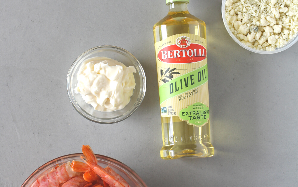 ingredients for this healthy shrimp recipe are olive oil, spices, hot sauce, shrimp and mayo